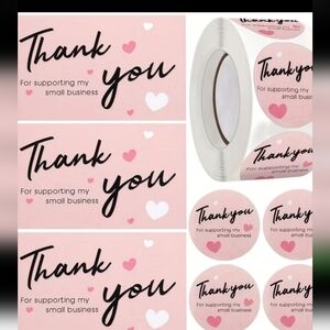Pink Thank You Cards And Roll Of Stickers.